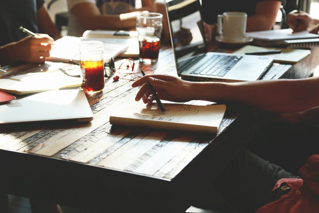 Entrepreneurs meeting over coffee to discuss business